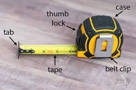 different parts of a self-return tape measure